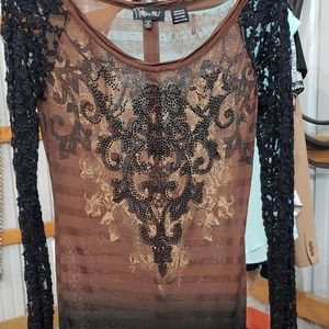 Used MissMe thin shirt. It is long